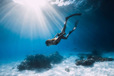 Man swimming in sea