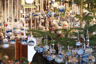 Christmas ornaments hanging in store for sale