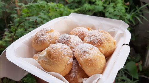 High angle view of choux in box