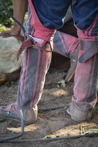 Low section of man working at construction site