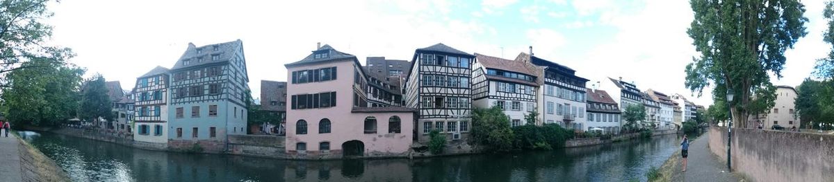 View of canal with buildings in background