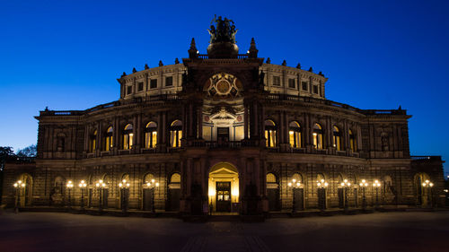 Facade of historical building at night