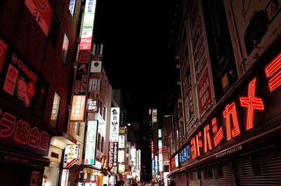 Low angle view of illuminated building at night