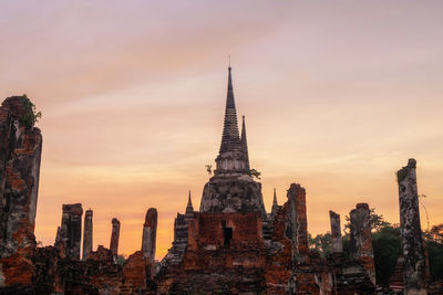 Panoramic view of temple building against sky during sunset