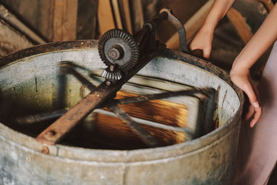 The process of extracting honey from bee honeycombs