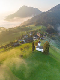 Aerial drone shot of sveti tomaž church in Škofja loka in slovenia