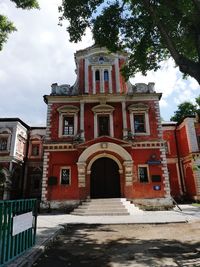 Entrance of historic building against sky