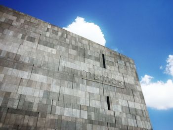 Low angle view of castle against blue sky