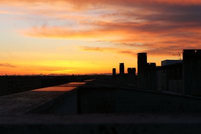 Built structure against sunset sky