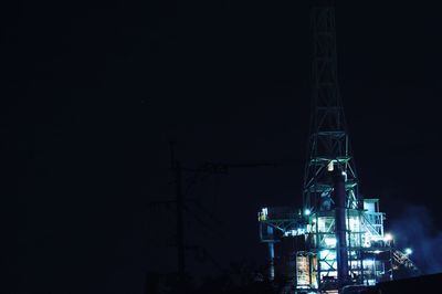 Low angle view of skyscrapers at night