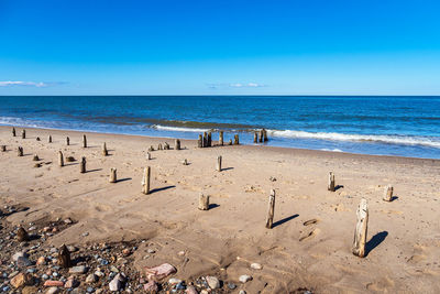 Scenic view of beach against sky