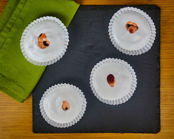 High angle view of cupcakes on table