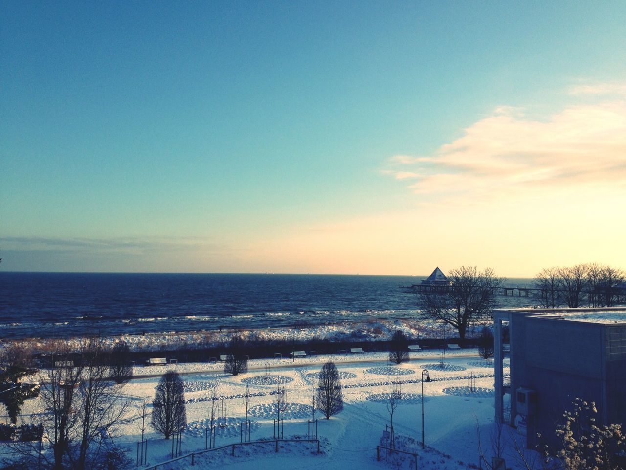 sea, horizon over water, water, tranquil scene, tranquility, scenics, sky, beauty in nature, cold temperature, winter, snow, nature, beach, sunset, idyllic, season, shore, outdoors, blue, weather