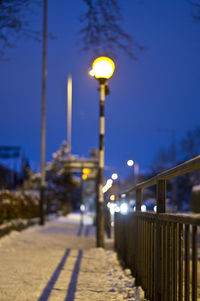 Illuminated street light at night