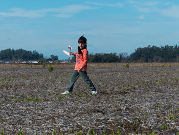 Boy running on field