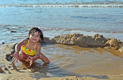 Portrait of smiling girl on beach