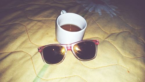 High angle view of coffee cup on table