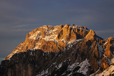 Scenic view of snowcapped mountains against sky during sunset. cortina dolomites in cadore, italy. 