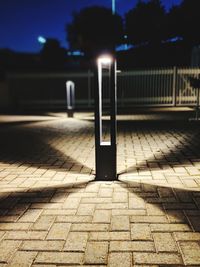 View of footpath at night