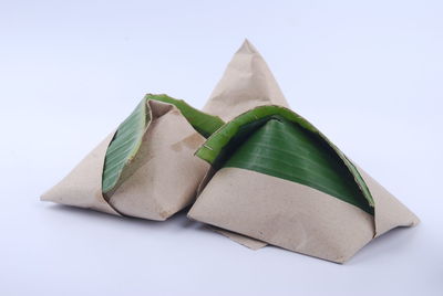 Close-up of cake against white background
