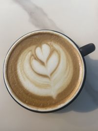 Directly above shot of cappuccino on table