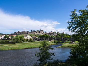 Distant view of carcassonne against sky