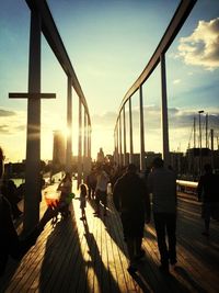 Silhouette of people at sunset