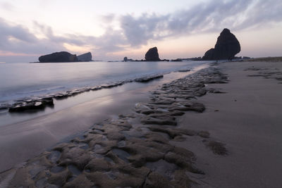 Scenic view of sea against sky during sunset