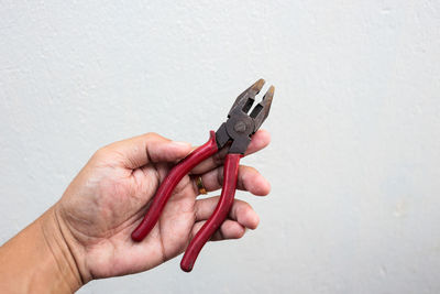 Close-up of hand holding stick