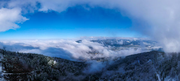 Scenic view of mountains against sky during winter