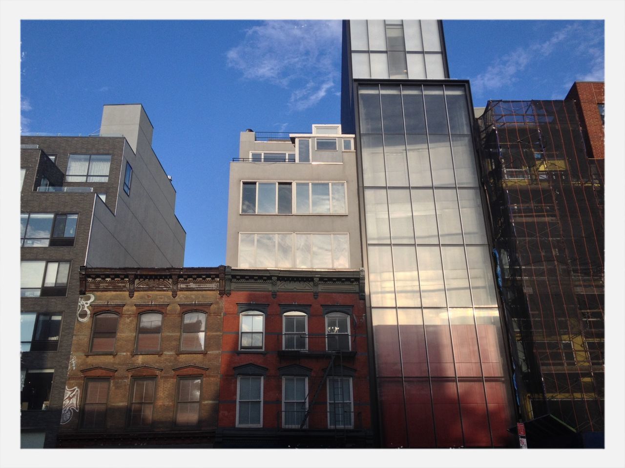 architecture, building exterior, built structure, low angle view, transfer print, window, sky, auto post production filter, building, city, glass - material, residential building, residential structure, blue, modern, office building, day, cloud, exterior, cloud - sky