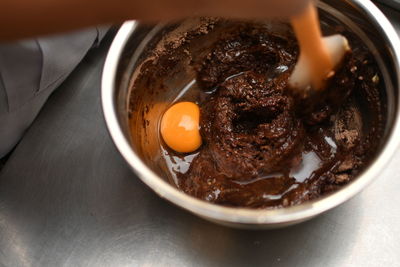 Midsection of man preparing food