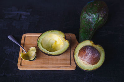 Close-up of fruits on cutting board