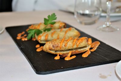 Close-up of food on slate at table