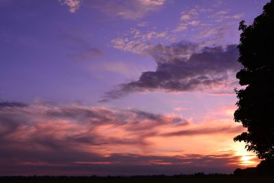 Low angle view of dramatic sky during sunset