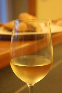 Close-up of wineglass on table