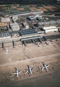 High angle view of airplane at airport runway