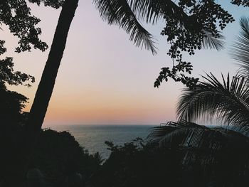 Scenic view of sea against sky at sunset