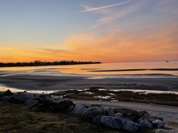 Scenic view of sea against sky during sunset