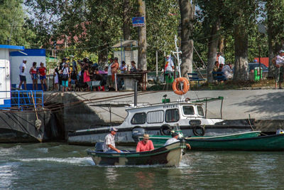 People on boat in water