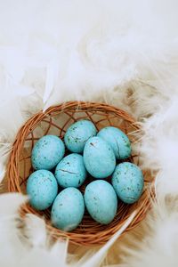 High angle view of eggs in basket