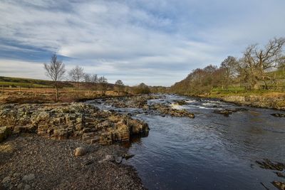 Scenic view of river against sky