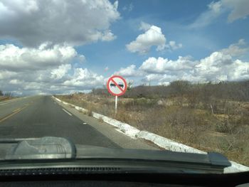 Road seen through car windshield