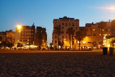 View of illuminated buildings at night