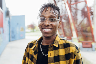 Happy young man wearing eyeglasses