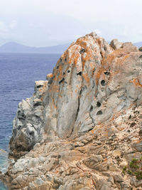 Wild sea landscape with white rocks and blue water in monte enfola, elba island, italy