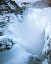 Scenic view of frozen waterfall