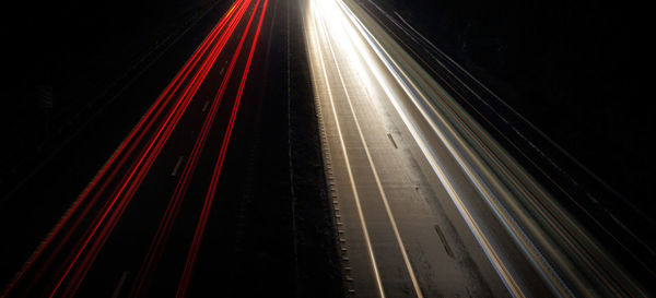Light trails on road at night