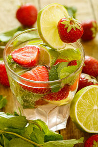 Close-up of fruits in glass on table