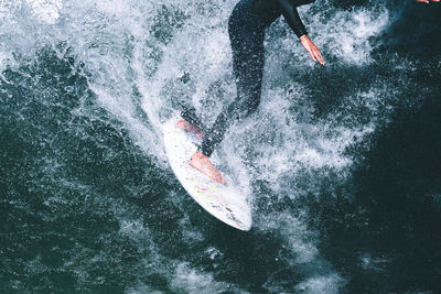 Man splashing water in sea